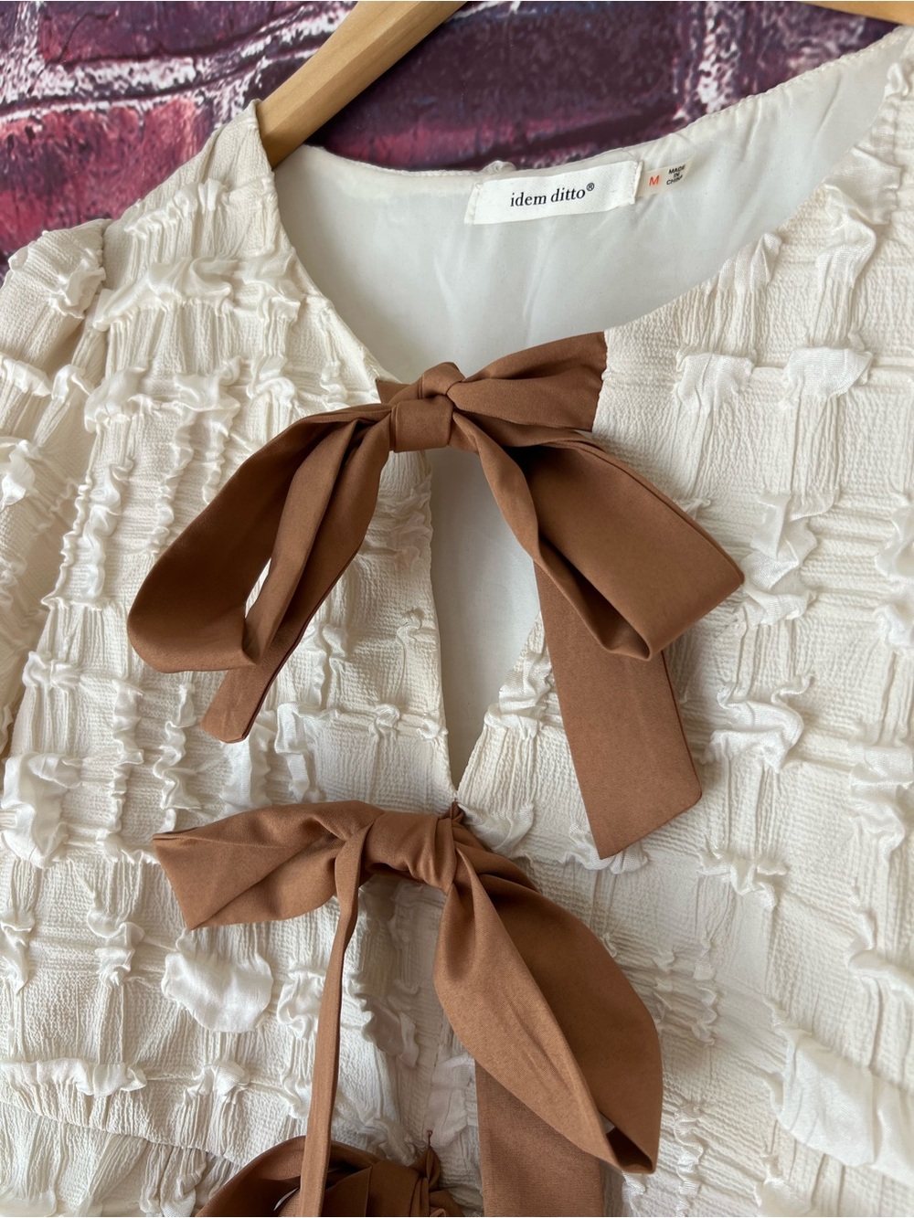 Idem Ditto Cream Bubble Textured Tie-Front Bow Babydoll Peplum Blouse - Picture 3 of 6